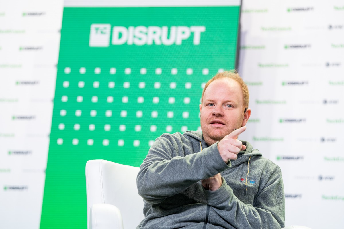 Parker Conrad, CEO at Rippling talks with Mary Ann Azevedo talk about "Going Global" at TechCrunch Disrupt in San Francisco on October 20, 2022. Image Credit: Haje Kamps / TechCrunch